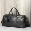 Handwoven Korean version large capacity travel bag, casual short distance portable bag, trendy fitness bag, single shoulder diagonal cross bag, large bag 230412