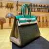 Bolsa de marca Bolsa de luxo Bolsa de pulso clássica 2530cm toda feita à mão com cor importada original com pele de avestruz Linha de cera de abelha francesa Hardware banhado a ouro 24K