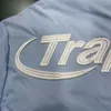 Venda imperdível A mais recente jaqueta de algodão Trapstar para baixo para homens com capuz azul gelo destacável patch bordado Marca de moda britânica