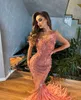Sparkly Mermaid Evening Dresses Sleeveless Bateau Neck Appliques Sequins Floor LengthFeather Train Diamonds Prom Dress Formal Gown Plus Size Gowns Party Dress