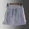 Femmes Hommes Shorts Designer Summer Beach Shorts Coton Mode Plaid Imprimé Pantalon De Cordon Détendu Casual Streetwear Pantalon De Survêtement Taille Asiatique M-3XL