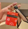 Unisex oortelefoonzak sleutelhanger mini-porteerbare opslag Bluetooth-headset beschermende dekking textuur munt portemonnee sleutelhanger