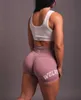 Darcsport tête de loup taille haute miel pêche hanches Fitness short de sport femmes été nu serré pantalons chauds 527