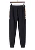 1 Herrspårsdräkter Designer Mens Tracksuit Luxury Men Sweatsuits Långärmad klassisk modeficka som kör casual man kläder kläder byxor jacka två bit tc03