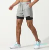 2024 Lululelemeni Men Yoga Sports Szybkie suche szorty Pocket Telefon komórkowy Casual Running Gym Short Jogger Pant z wewnętrznym KGI668