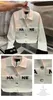 Kvinnor SS Designer Jackor Top Quality Lapel Polo Fashion Bröstficka Slim Fit White Embroidery Tryckt Metal Buckle Sticked Long Sleeved Cardigan Jackets