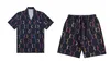 Survêtements de survêtement pour hommes sets imprimer patchwork revers à manches courtes à manches courtes à manches décontractées shorts de plage d'été