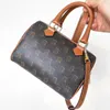 Stilista Mini celins TRIOMPHE CANVAS Borsa da viaggio boston Borsa tote di lusso in pelle Borsa a tracolla pochette da donna Borsa a tracolla a secchiello con fiore marrone a forma di fiore marrone