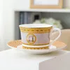 Moda Creative Creative Vintage Chep Copo Gilt Gilt Gild Porcelain Presens de porcelana Big Mark Tea Cup Plate Rack