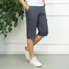 Mäns shorts Men Multi-Pocketed Kne-Längd i Khaki Black Navy Army Green Side Pockets Design Short Pants Summer Style Daily Wear