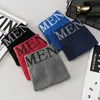 Cuecas 4pcs/lot masculino cuecas de roupa íntima sexy calcinha de homem letra impressão cuecas respiráveis ​​confortáveis ​​machos biquíni preto shorts novos w0412