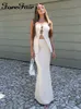 Dwuczęściowa sukienka przedniej części sexy klubowa impreza klatki piersiowej pusta damska top i wysoka talia midi spódnica biała strój 230411