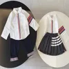 2023 Bebê roupas infantis designer menino camisa xadrez terno menina saia xadrez moda terno infantil primavera e verão terno de mangas compridas 100-150cm M14