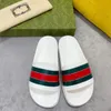 Beste kwaliteit echt leer g slippers dezelfde stijl ontwerper 2023 populaire familie dames zomer nieuwe oude bloem platte sandalen mode uitloper strand sandalen dames trend