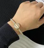 Braccialetto di design di gioielli classici Placcatura in oro 18 carati di fascia alta Marca Bracciale a doppia lettera a cerchio Unisex con strass di cristallo San Valentino Accessorio per la festa nuziale