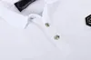 新しいフィリッププレーンメンTシャツデザイナースカルスカルPPポロシャツ半袖ブランド春と夏のラペル品質TシャツTOPS PP9003