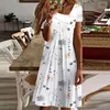 Podstawowe sukienki swobodne damski sukienka A-line elegancka botaniczna kwiat nadruk krótkie rękawowe pullover sukienne żeńskie street street sukienki 231110