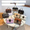 70% de salida de fábrica de bolsos de diseñador Bolso de mujer Bolso de mensajero de cuero de alta calidad Bolso cruzado para mujer Tarde en venta