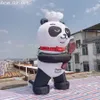 Söt 3 m hög uppblåsbar panda kock som annonserar djurmodell med sked för restaurangdekoration eller marknadsföring