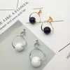 Dos Boucles D'oreilles Grace Jun Personnalité Simple Blanc Et Noir Forme De Boule Planétaire Conception Femelle Pas D'oreille Trou Vis Clip Corée Style