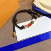 Bracelet de créateur de concepteur doré de femmes