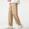 Męskie spodnie Spring Men Bawełniany ładunek obfity Hip Hop Joggers sznurka streetwear elastyczna talia luźna prosta praca spodni