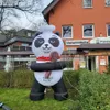 Söt 3 m hög uppblåsbar panda kock som annonserar djurmodell med sked för restaurangdekoration eller marknadsföring