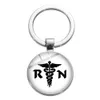 10 Pcs/Lot Fashion Key Rings Custom Glass Nursing is A Work of Heart RN NICU Hospital Keychain For Nurse Doctor Gift