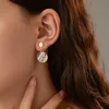 Boucles d'oreilles circulaires en forme de goutte d'huile de zèbre coloré, avec tempérament polyvalent et boucles d'oreilles en alliage minimalistes pour femmes, offre spéciale