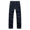 Męskie dżinsy plus size zima polar grube ciepłe proste biznes swobodny spodni elastyczność dżinsowe spodnie marki 46 48 50 52