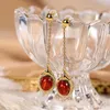 Studörhängen S925 Sterling Silver Gold-Plated Natural Blood Amber Light Luxury Hollow Earring Pendant For Ladies