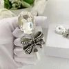 Kolczyki Dangle Mash Bow Crystal Ear Clip Wyolbrzymione duże kobiety Najwyższa jakość luksusowa biżuteria Europa Ameryka Projektantka marka