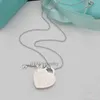 Tasarımcı Takı Kolye T Family Klasik Aşk Markası Anahtar Kolye Kalp Şeklinde Kolye S925 Gümüş Yüksek Baskı Minimalist Tasarım O-Bone Zinciri Qno2