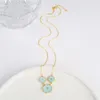 Collane con ciondolo Moda femminile Lusso Cinque foglie Fiore 7 colori Lucky Clover Pendenti Catena Girocollo Gioielli