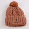 Carharttlys Bonnet Chapeau Designer Qualité Originale Automne Et Hiver Nouvelle Boule De Laine Tricot Chapeau En Peluche Épaissie Pâte Frite Torsades Chapeau De Laine Couleur Unie Pour Hommes Et Femmes