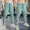 Pantalon pour hommes gym fitness courant pantalon de survêtement