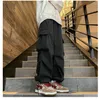 Pantaloni da uomo stile coreano cargo streetwear moda harem pantaloni larghi casual a gamba larga pantaloni da jogging da uomo neri