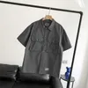 2023 Moda de moda masculina e feminina Ferramenta de alta marca de rua Carhart Wip Work Trabalho Primavera/Verão Label Multi Pocket Manga curta H3YY