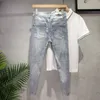 Designer nieuwe herenjeans gescheurd lichtblauw donkergrijs merk herenbroek Broeken Street jeans strak slank denim topkwaliteit letterpatroon