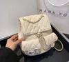 Sacs de soirée Mode Sac à dos Usine % 85% Vente en gros et au détail Nouveau Xiaoxiangfeng Duma Frog Caviar Diamondback Chain Double Pocket Litchi Pattern Backpack