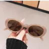 Lunettes de soleil Fashion Cat Eye Femmes Bright Small Frame Shades Retro Lunettes Sport Jelly Candy