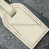 Totes Borsa di design di qualità la borsa tote borse in denim strisce esterne lettera morbida singola Borsa da viaggio firmata in pelle bovina con manicoeleganteborsenegozio