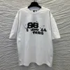 Lüks Tasarımcının Yeni Erkekler Kadınlar Kısa Kollu Spor Giyim Seti Gömleği Yüksek Baskı Yeni Hpainted Grafiti Mektup Baskı Bulmuş ve Unisex Kısa Kollu T-Shirt