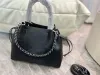 Mt Tote Purse Bucket Bag Läder Perforerat mönsterhandtag Handväska Kvinnor Fashion Retro Angled axelväska Kvinnlig shoppare ryggsäck