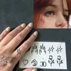 Dövme kitapları su geçirmez geçici çıkartma alev aşk kalp çiçek yıldızı selfie vücut sanatı sahte dövme flaş tatoo üzerinde parmak üzerinde erkekler 231113