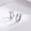 Orecchini a bottone S925 in argento sterling con fibbie per orecchie a linea incrociata a faccia larga per donne Un paio di stile freddo semplice e versatile