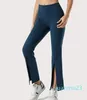 Pantalones de yoga para mujer, nueva moda, pantalones acampanados con abertura frontal de alta gama, hermosas nalgas, pantalones deportivos elásticos, ajustados, transpirables y de secado rápido