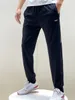 Menbroeken splitsen sport casual sportkleding broek paar katoenen mode geborduurde logo hardlopen trainingsbroek