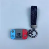 Key Rings Game Console Style för Volkswagen VW Golf 7 GTI MK7 Touran Skoda Octavia Seat Leon Car Flip Key Case Cover Protector Keychain J230413