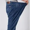 Herr jeans klassiska stretch jeans män överdimensionerade plus size big denim manlig lös elastiska byxor 44 46 48 50 52 hög midja långa arbetsbyxor w0413